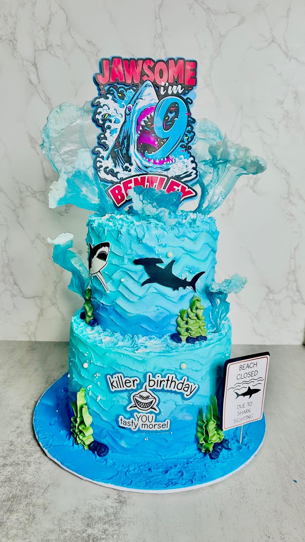 Shark themed two tier birthday cake